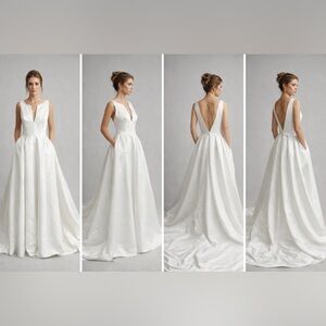 7. Handmade in Spain, Elegant V-Neck White Bridal Ball Gown Dress